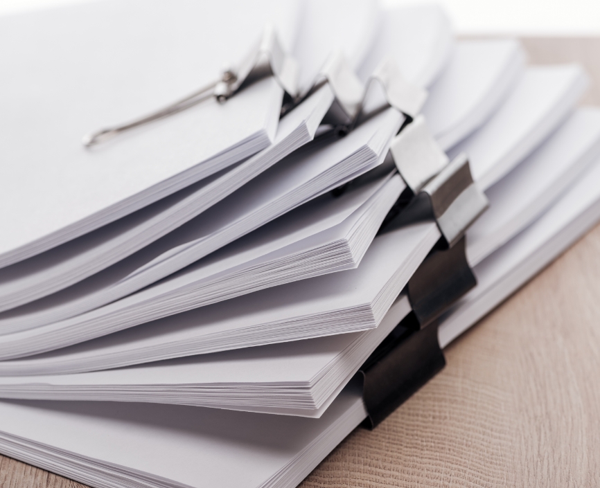 close-up-view-of-stacks-of-blank-paper-with-metal-11
